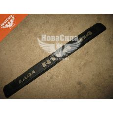 Облицовка крышки багажника 21213-Н.Тайга над номер. (СНГ) (пла. планка)