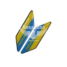 Наклейка с надписью Україна (сине-желтый фон) (силикон) 11х2,9 (68-74)