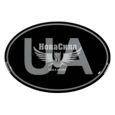 Наклейка UA (овал на черном фоне) (силикон) 8,3x5,6 (68-51)