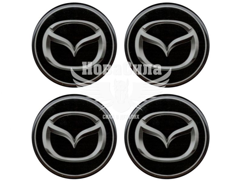 Наклейка Mazda на ковпаки (силікон) чорна діам. 5х5 (67-83)