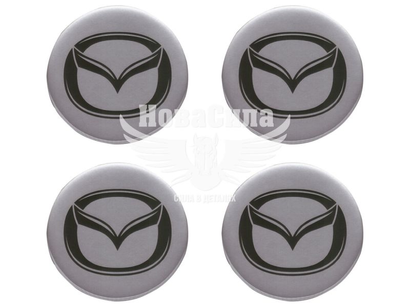 Наклейка Mazda на ковпаки (силікон) срібна діам. 5х5 (67-83)